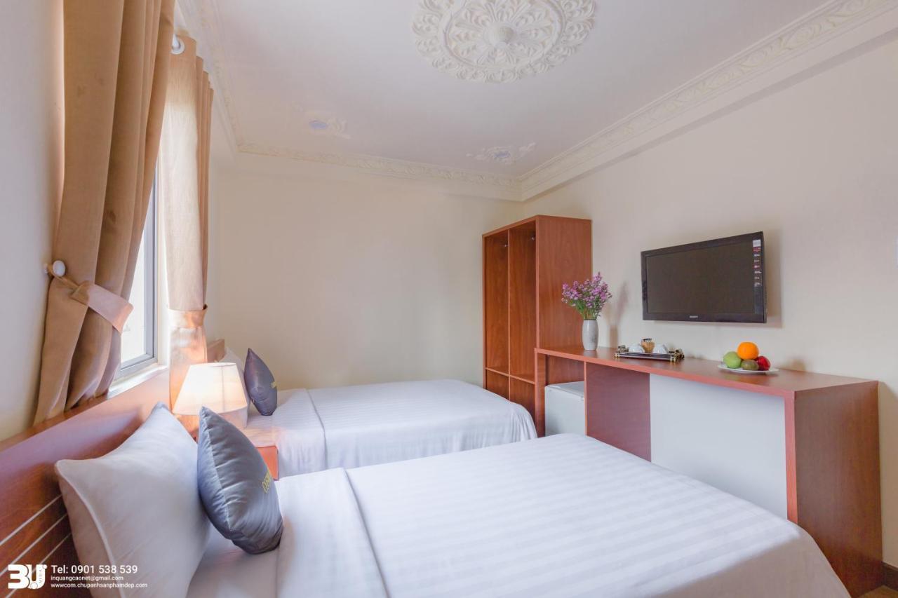 Cosmo Square Hotel Thành Pho Ho Chí Minh Esterno foto